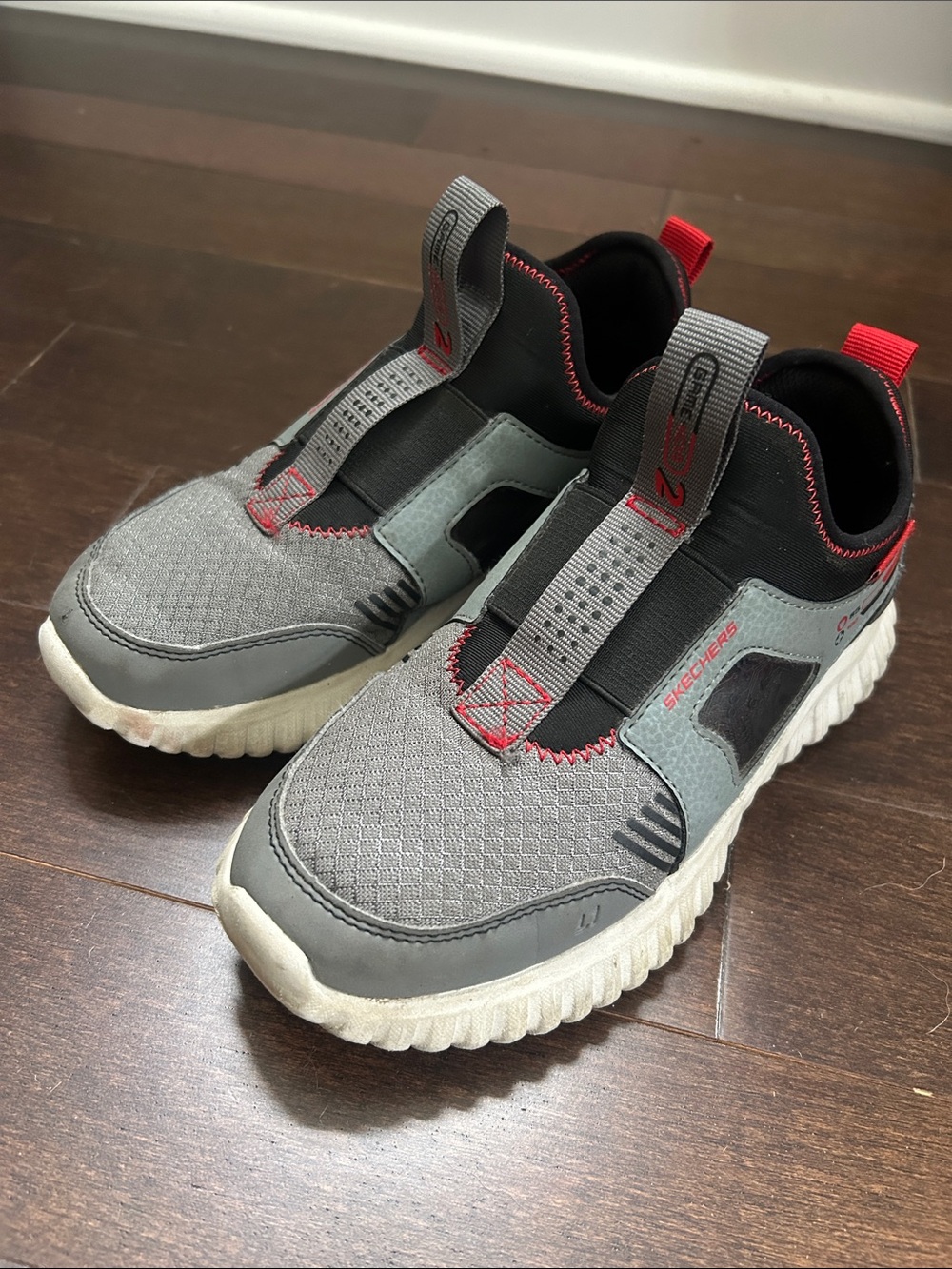 Skechers Kids Gray and Red Slip-On Athletic Sneakers